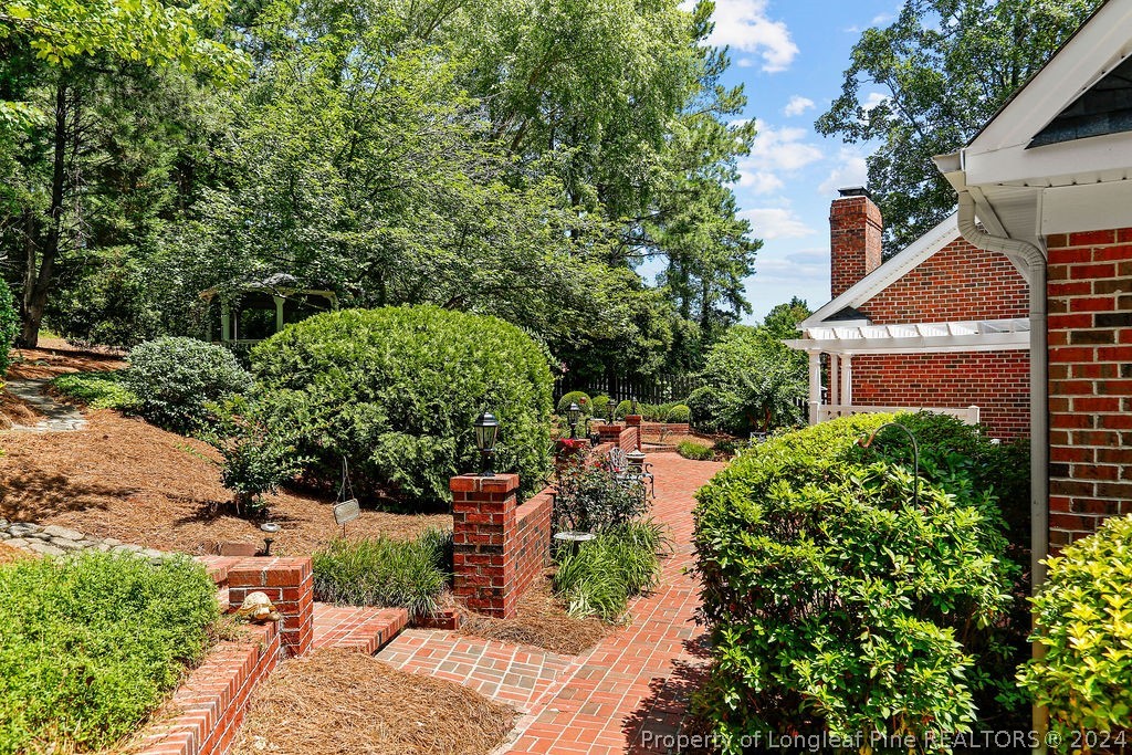 300 Shawcroft Road Fayetteville, NC 28311 - Photo 32 of 42 view of a house with a yard