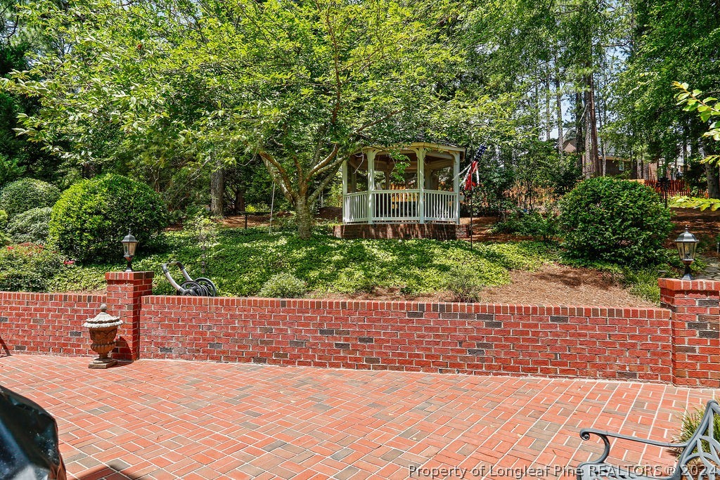 300 Shawcroft Road Fayetteville, NC 28311 - Photo 33 of 42 a view of a backyard with plants