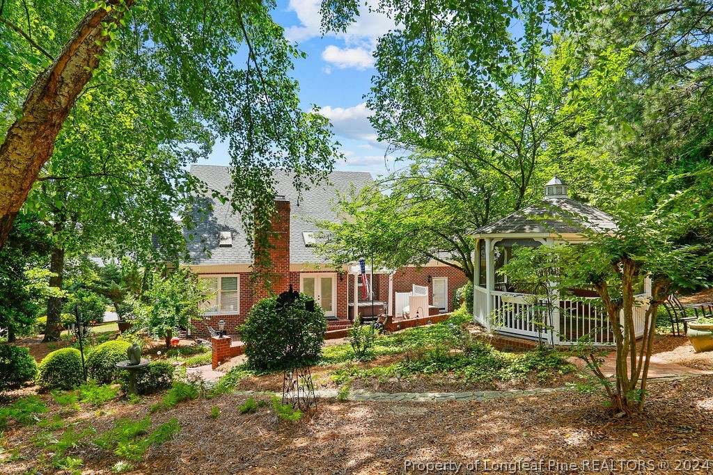 300 Shawcroft Road Fayetteville, NC 28311 - Photo 36 of 42 a front view of a house with a yard