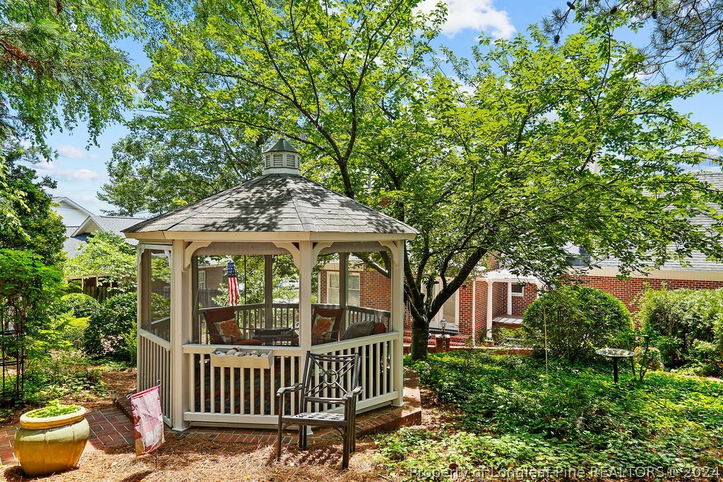 300 Shawcroft Road Fayetteville, NC 28311 - Photo 37 of 42 a view of a house with a porch and furniture