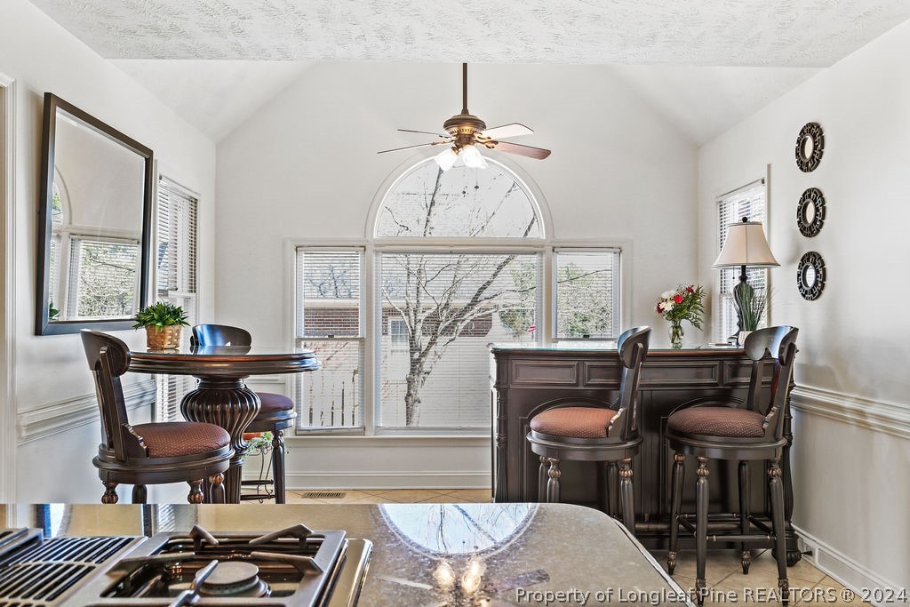 300 Shawcroft Road Fayetteville, NC 28311 - Photo 10 of 42 a living room with furniture a piano and a window