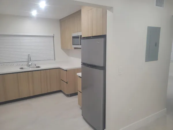 a room with a washer and dryer