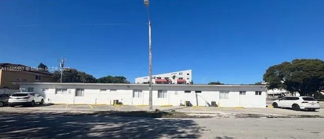 a view of a street with cars