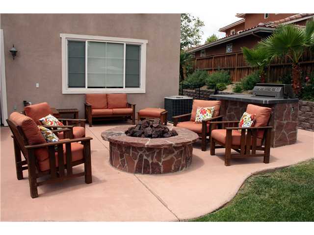 1599 Archer Road San Marcos, CA 92078 - Photo 24 of 25 Inviting outdoor living, gas fire pit and grill. Lush landscaping.