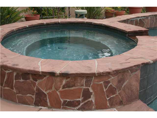 1599 Archer Road San Marcos, CA 92078 - Photo 4 of 25 Hot tub with cascading waterfall into pool. Custom tile work.