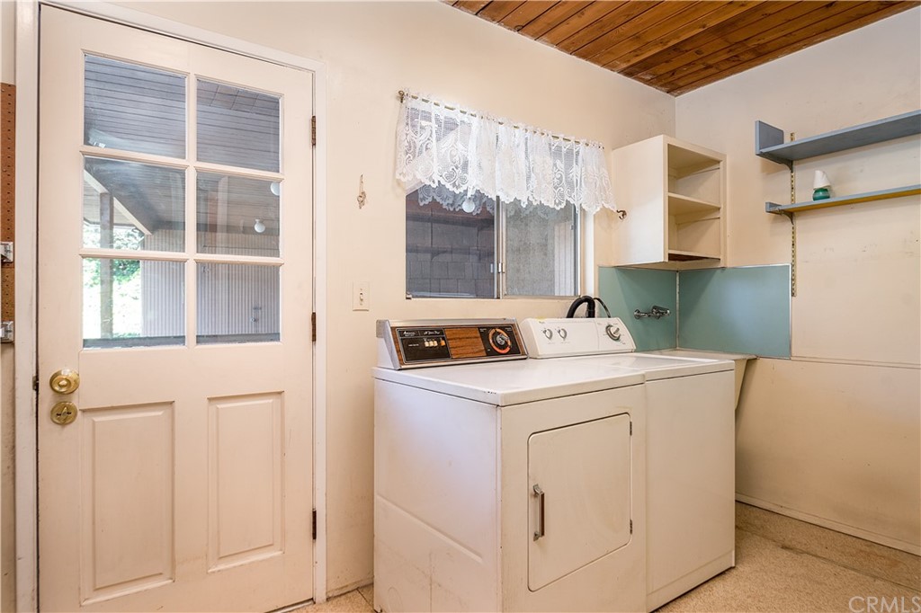 7214 Canyon Drive Whittier, CA 90602 - Photo 21 of 40 a utility room with dryer and washer