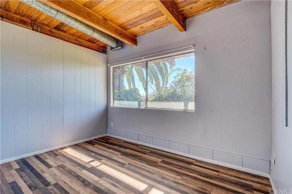 7214 Canyon Drive Whittier, CA 90602 - Photo 24 of 40 a view of a room with wooden floor and windows