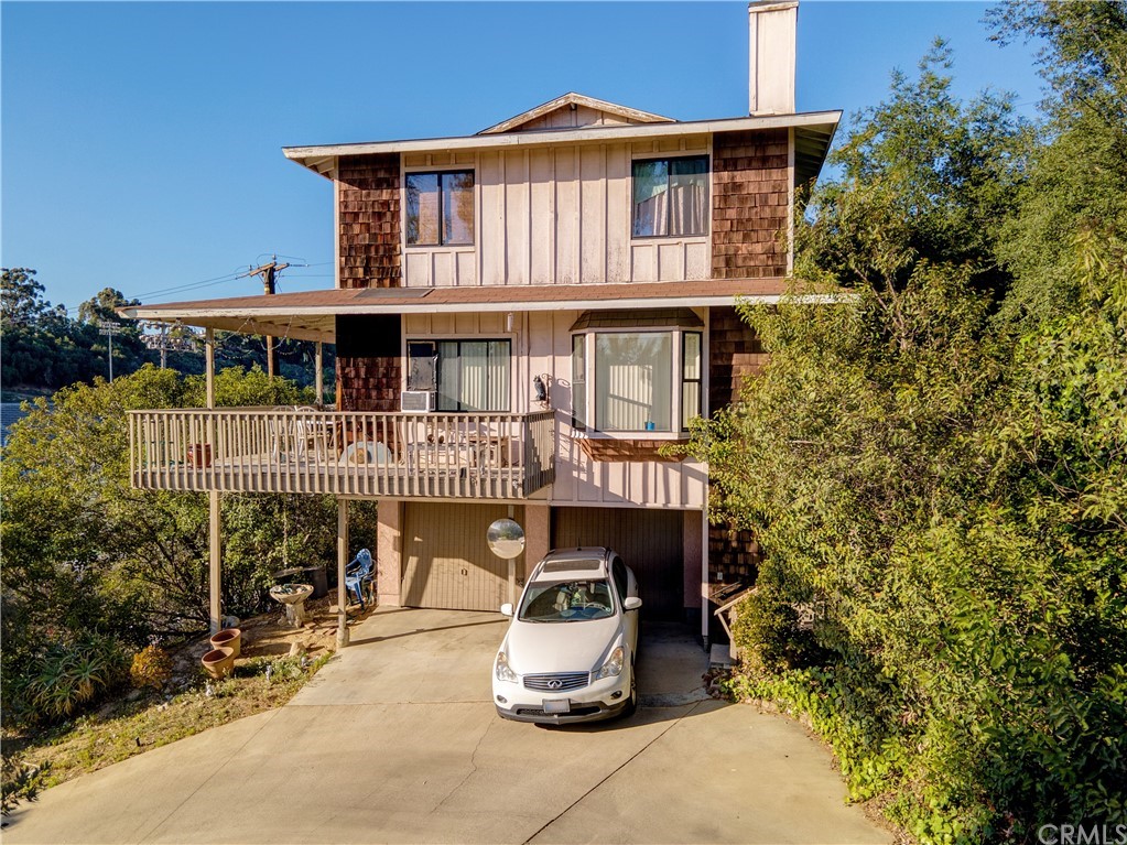7214 Canyon Drive Whittier, CA 90602 - Photo 39 of 40 a front view of a house with a garden
