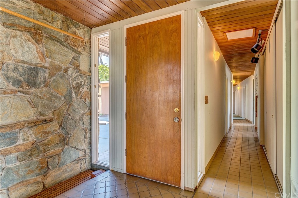 7214 Canyon Drive Whittier, CA 90602 - Photo 4 of 40 a view of a bathroom with wooden floor and a shower