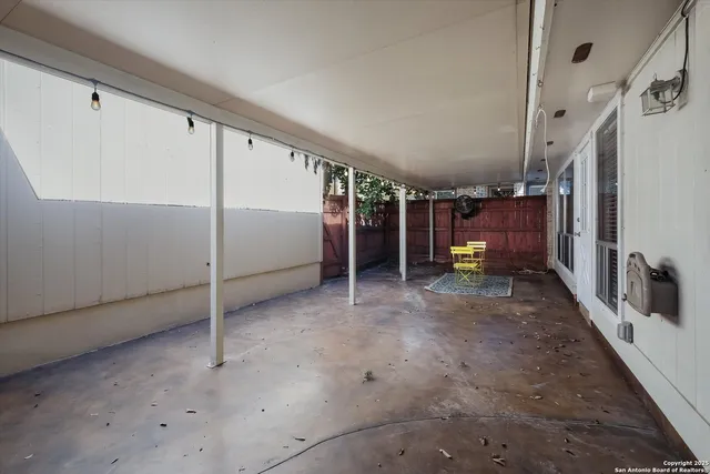 a view of a livingroom with stairs