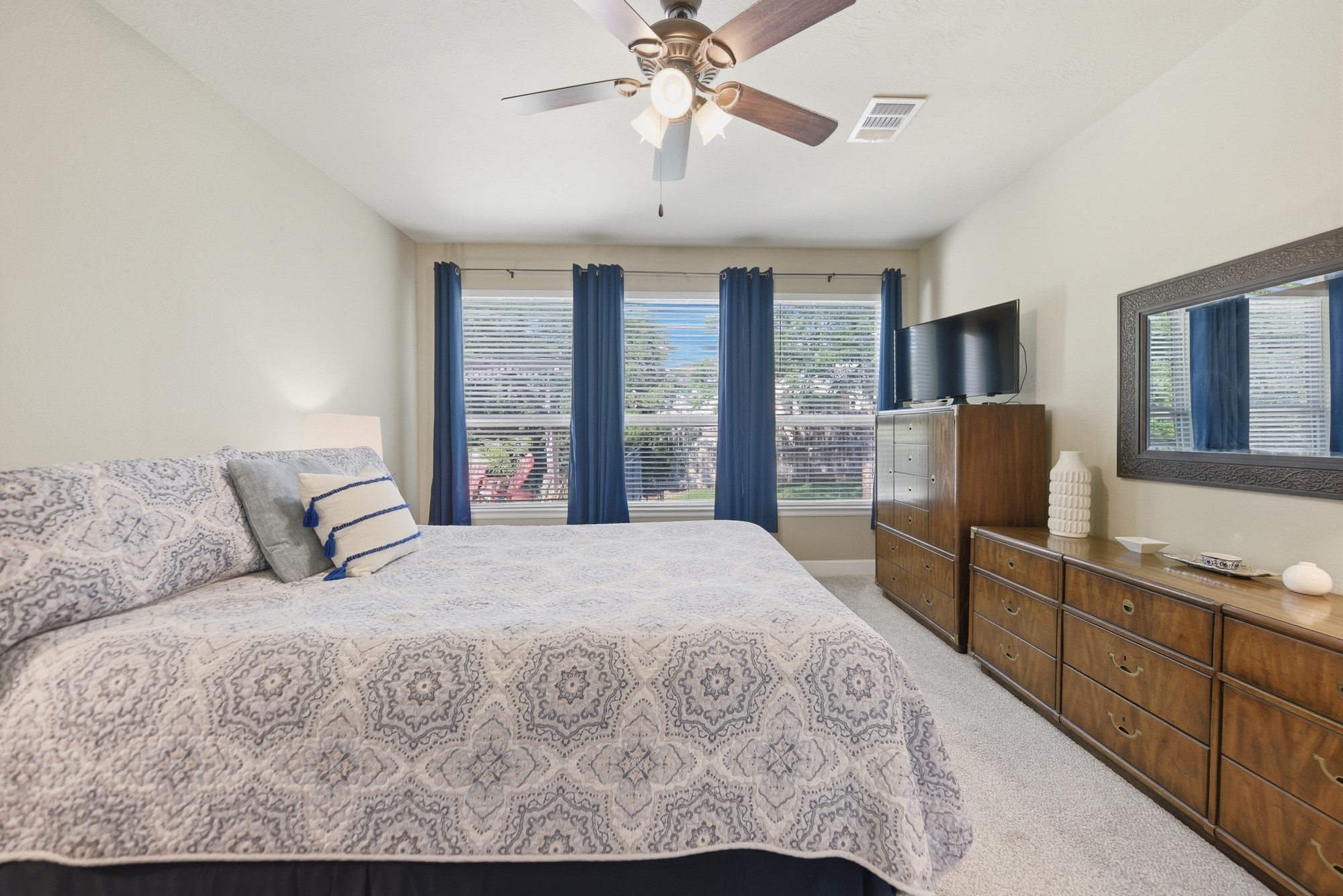 2205 Ralston Creek Court Brenham, TX 77833 - Photo 16 of 37 a bedroom with a large bed and a window
