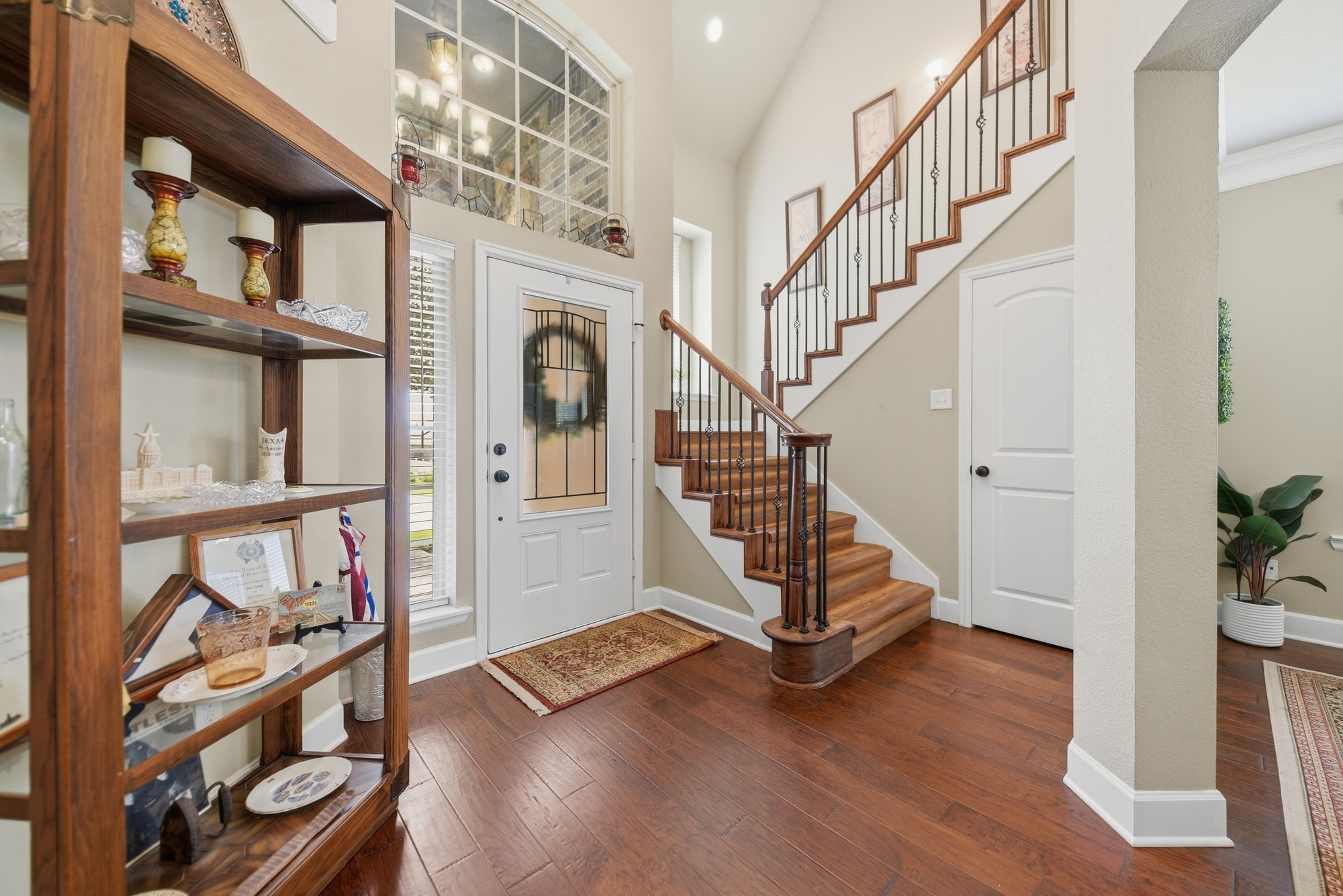 2205 Ralston Creek Court Brenham, TX 77833 - Photo 6 of 37 a view of an entryway with wooden floor and staircase