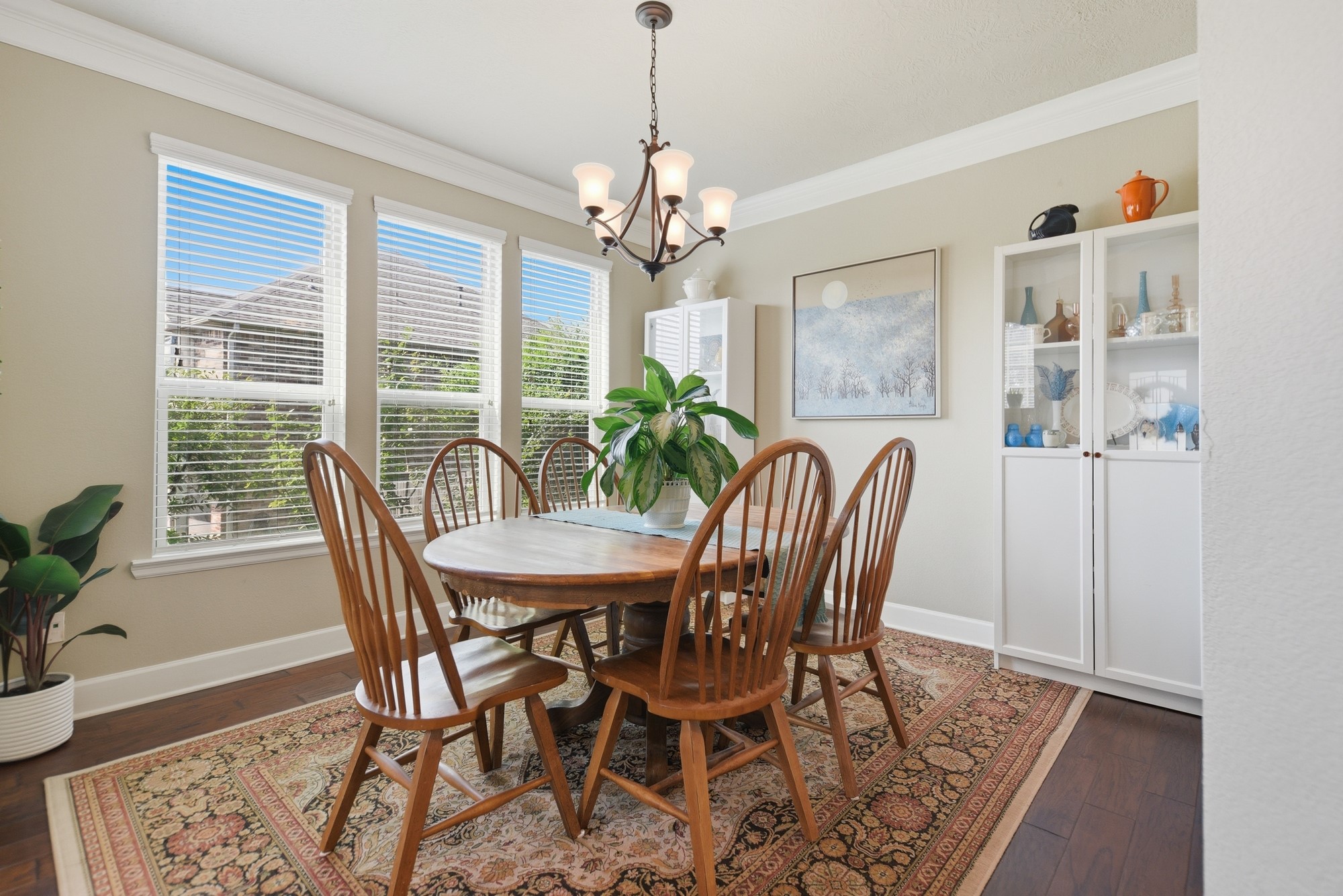 2205 Ralston Creek Court Brenham, TX 77833 - Photo 8 of 37 a view of a dining room with furniture window and wooden floor