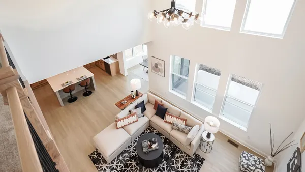 a view of living room with furniture and rug