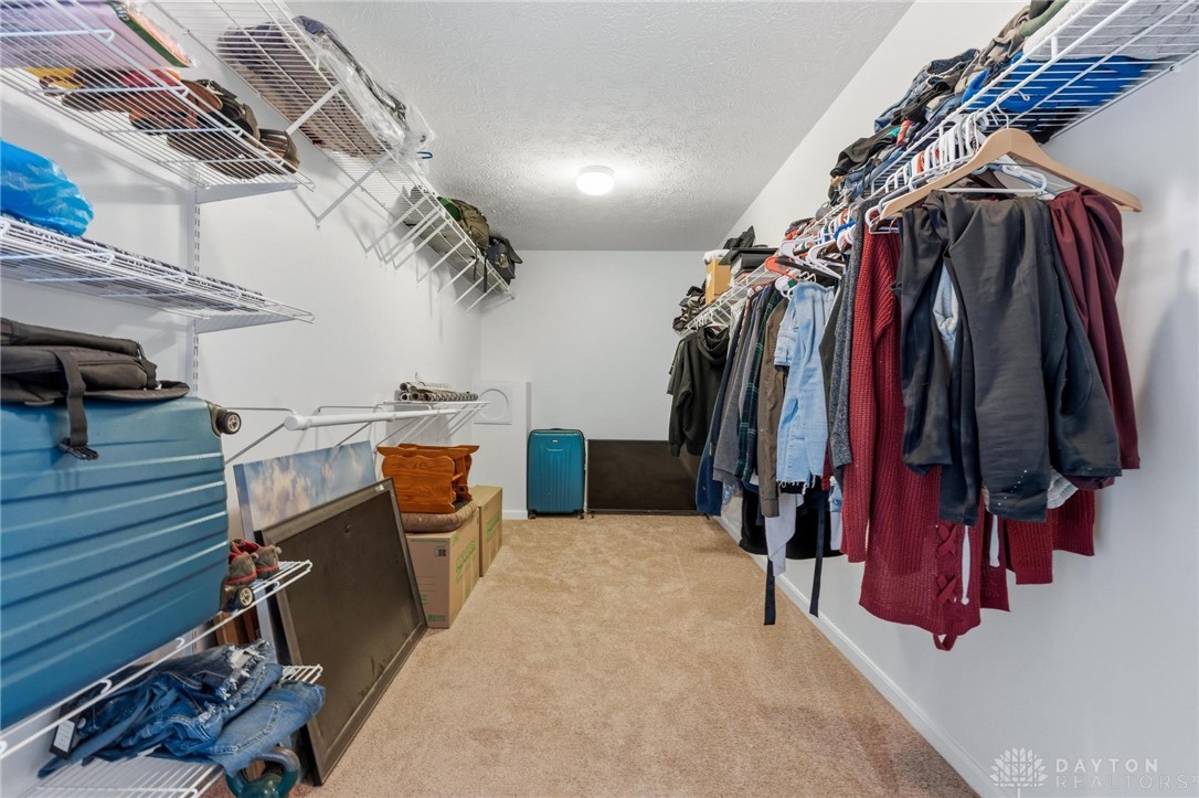 70 Martin Lane Springboro, OH 45066 - Photo 38 of 69 This spacious closet offers ample storage and organization solutions.