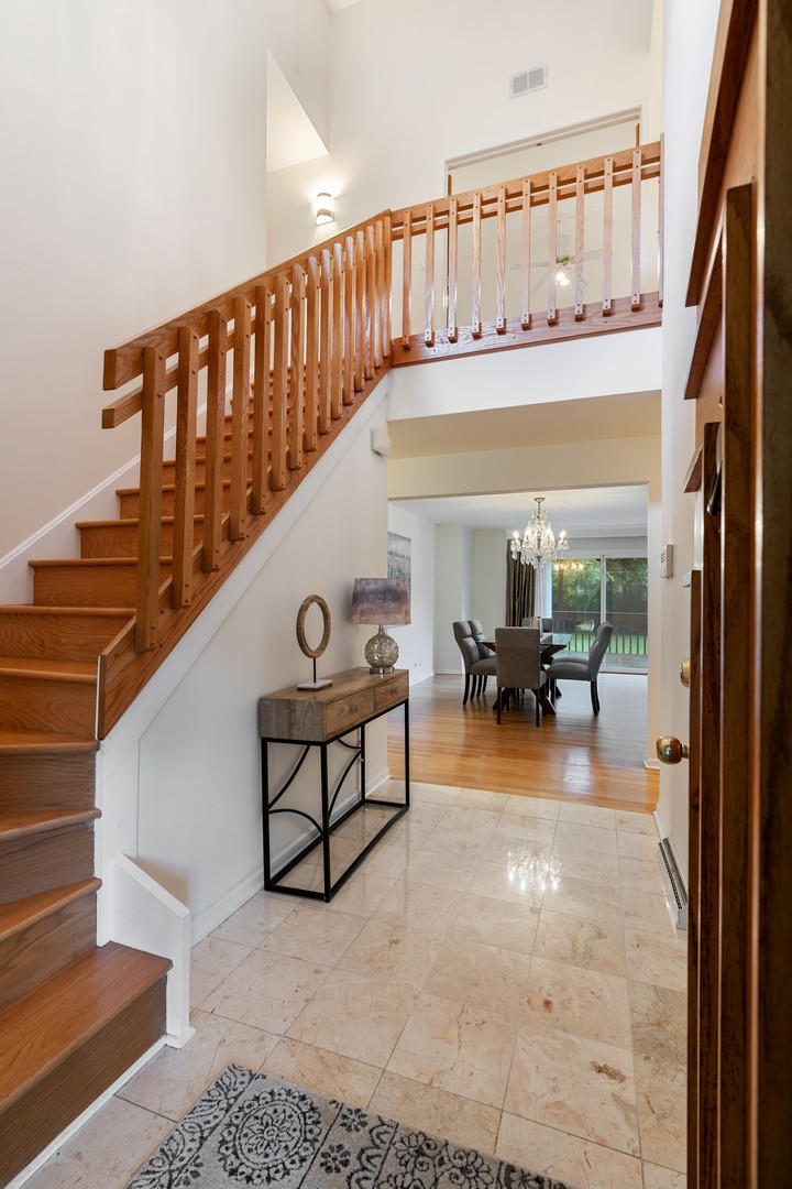 336 Beverly Drive Wilmette, IL 60091 - Photo 2 of 34 a view of entryway and hall with wooden floor