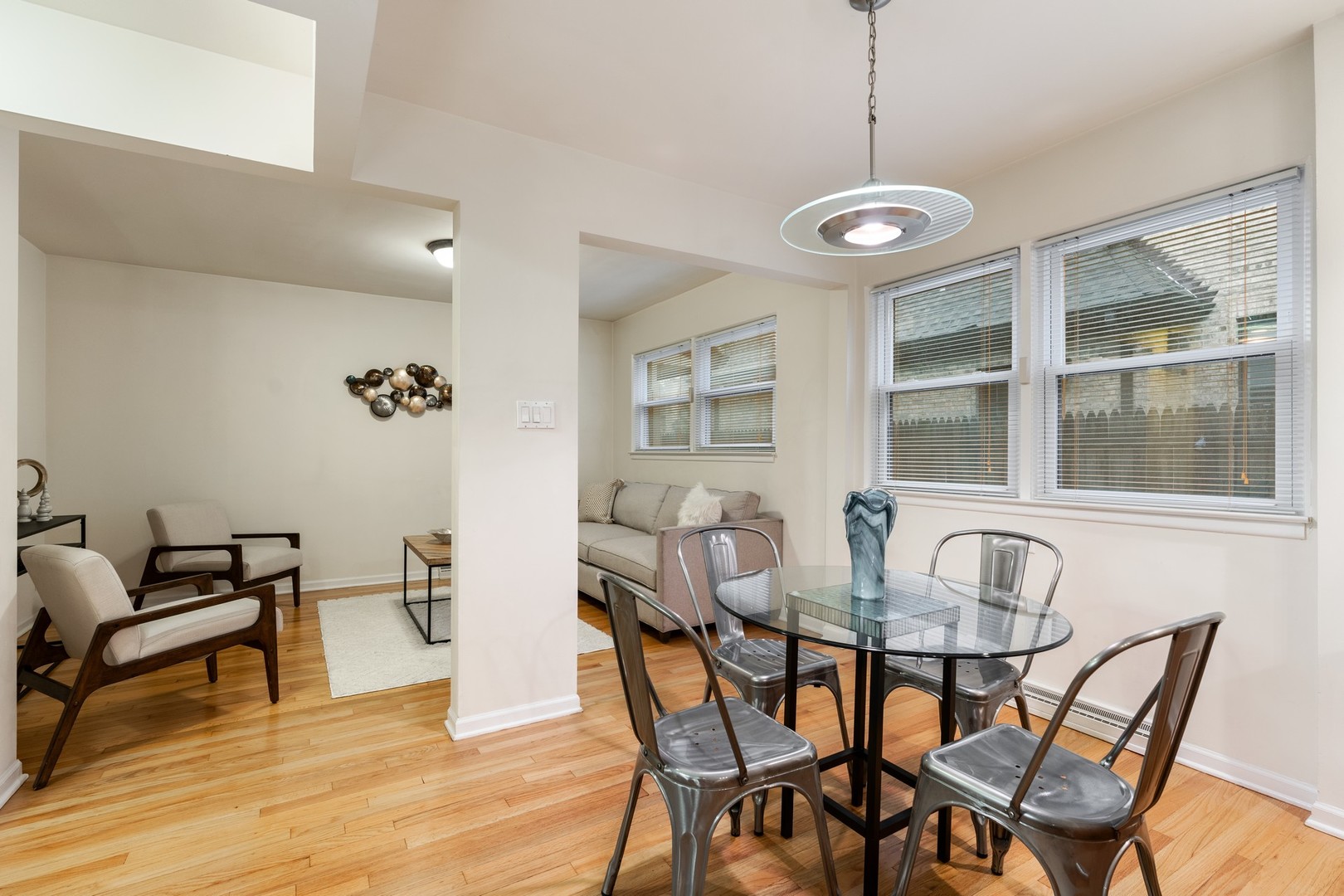 336 Beverly Drive Wilmette, IL 60091 - Photo 11 of 34 a view of a dining room with furniture and windows