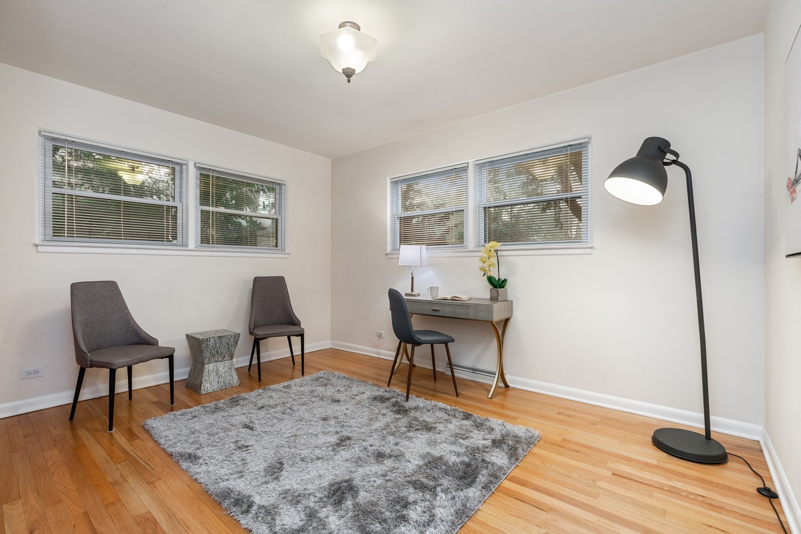336 Beverly Drive Wilmette, IL 60091 - Photo 14 of 34 a view of a workspace room with wooden floor and windows