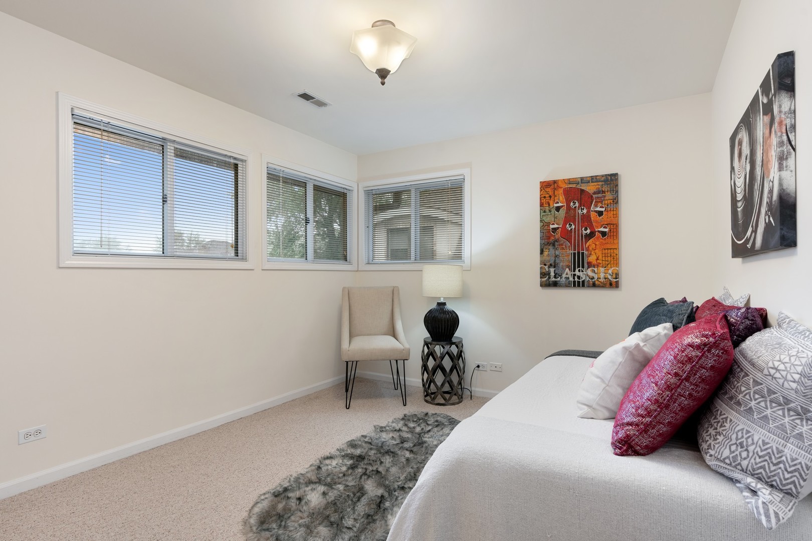 336 Beverly Drive Wilmette, IL 60091 - Photo 24 of 34 a bed room with a bed and a chair