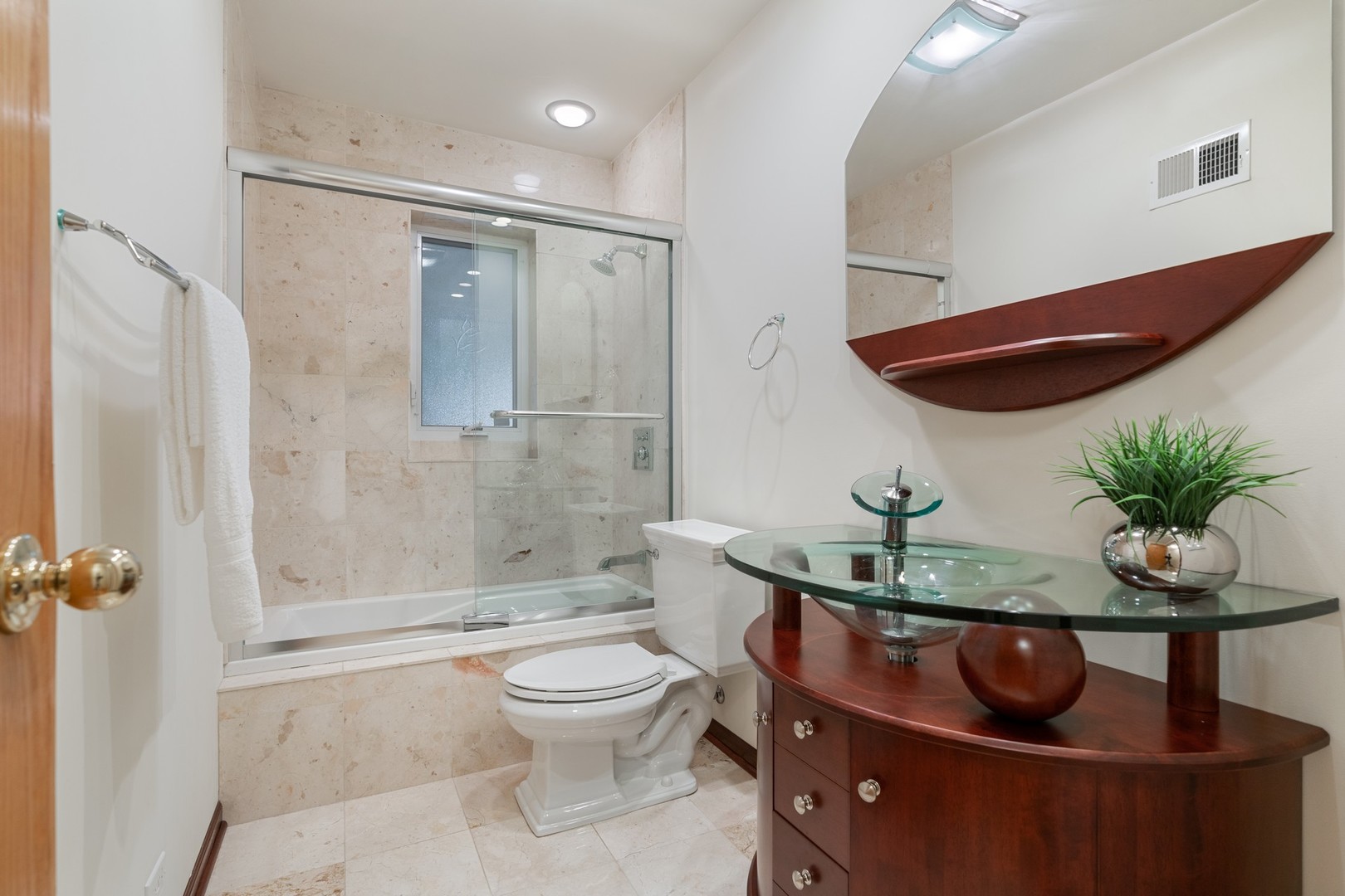 336 Beverly Drive Wilmette, IL 60091 - Photo 26 of 34 a bathroom with a sink a toilet and shower