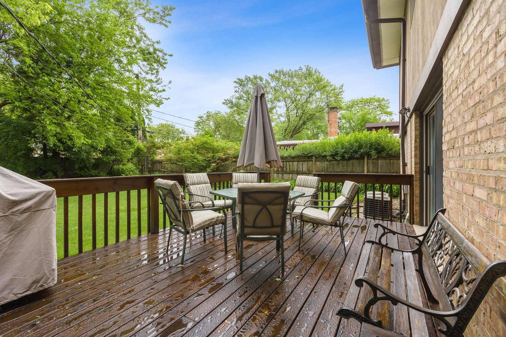 336 Beverly Drive Wilmette, IL 60091 - Photo 27 of 34 a view of a deck with chairs and wooden floor