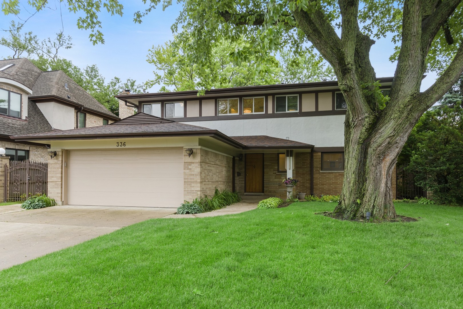 336 Beverly Drive Wilmette, IL 60091 - Photo 31 of 34 front view of a house with a yard