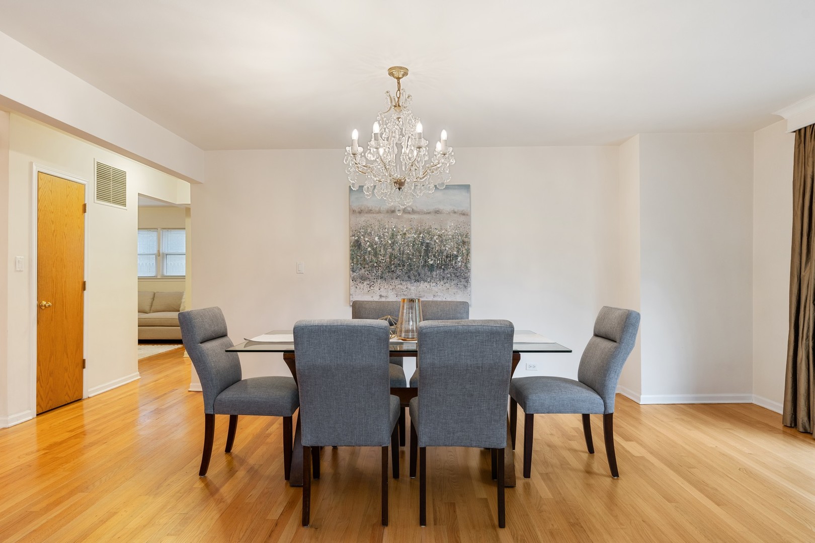 336 Beverly Drive Wilmette, IL 60091 - Photo 6 of 34 a view of a dining room with furniture window and wooden floor