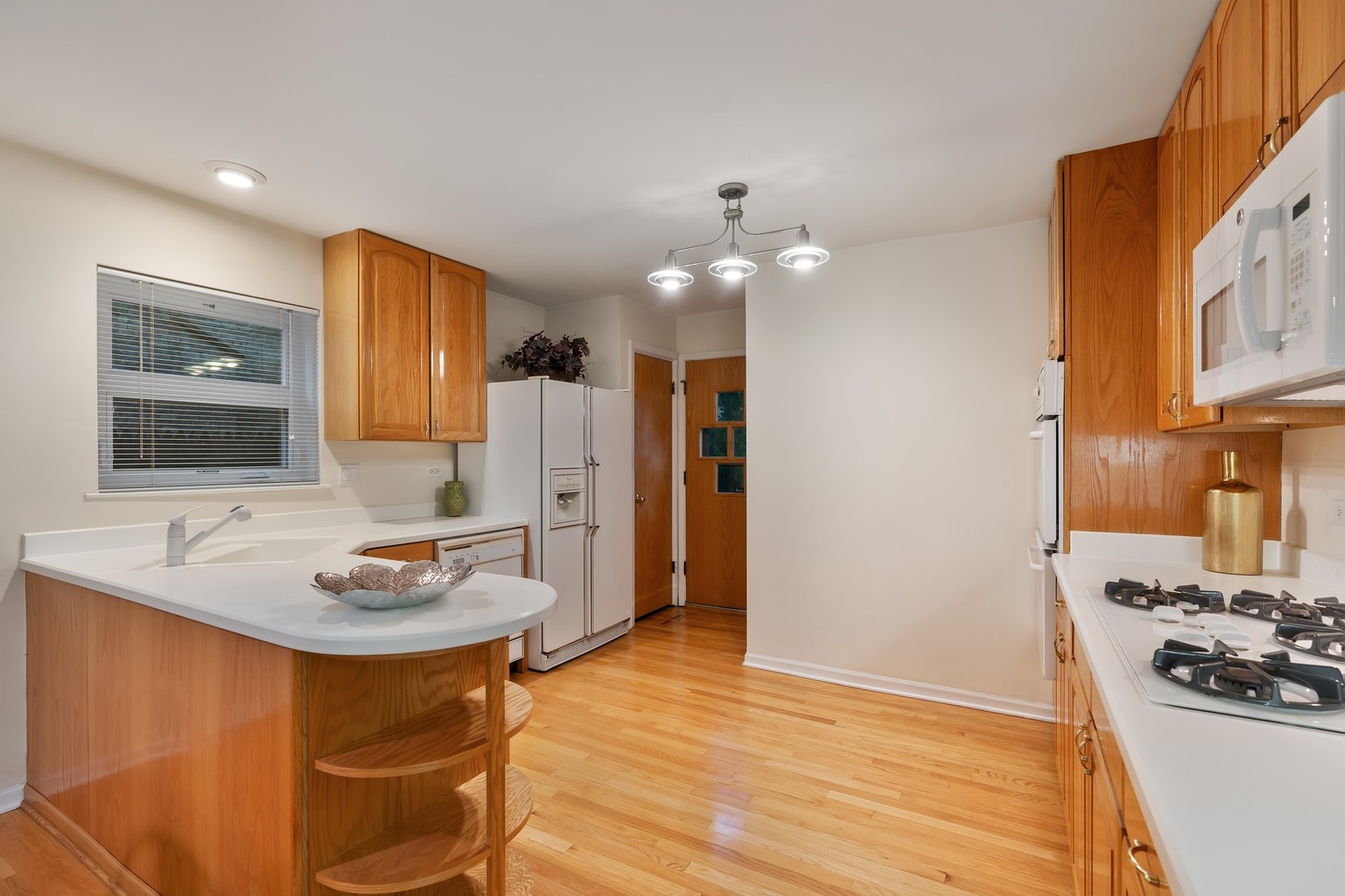 336 Beverly Drive Wilmette, IL 60091 - Photo 9 of 34 a kitchen with a sink appliances and cabinets