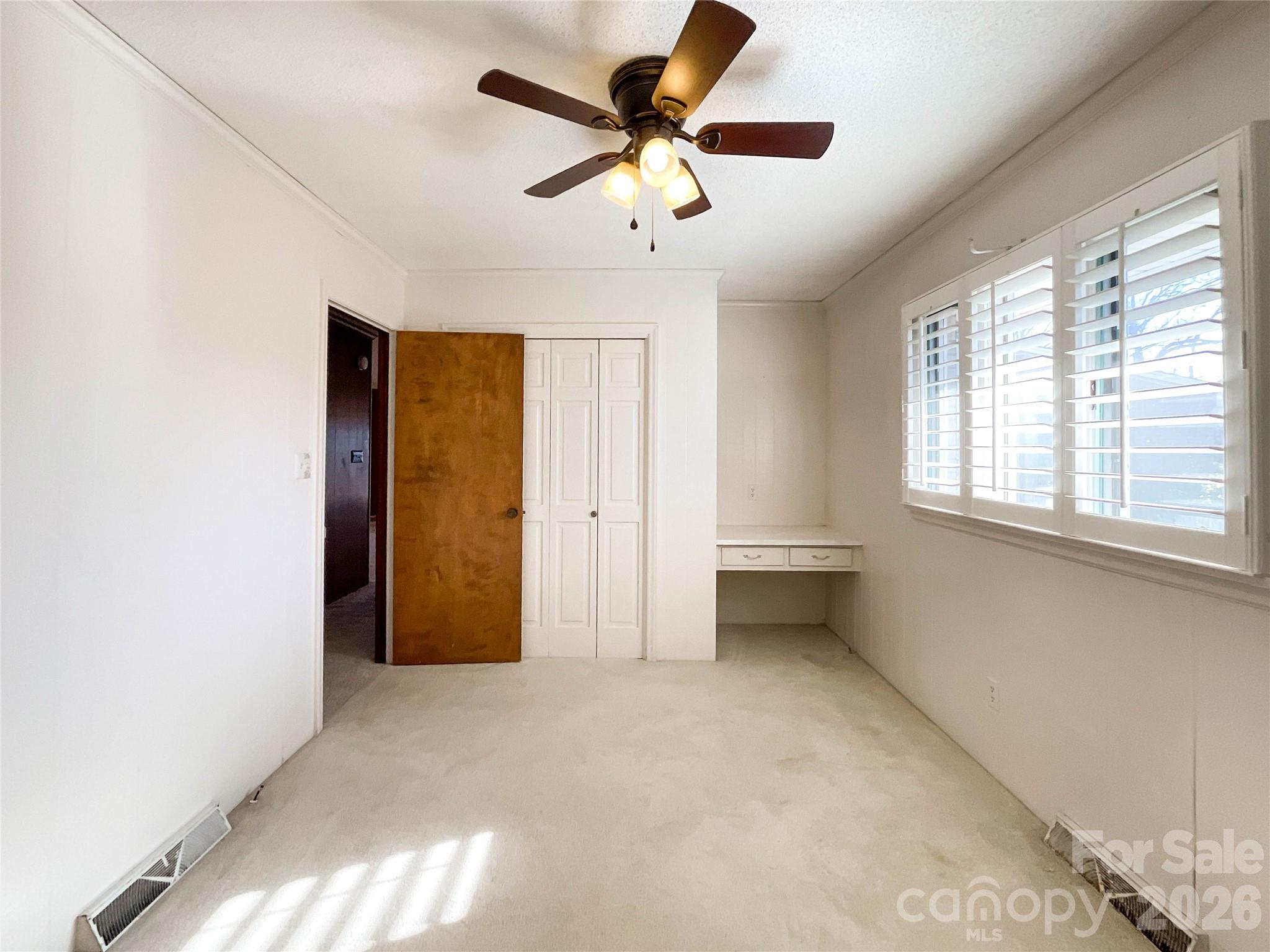 13909 Idlewild Road Matthews, NC 28105 - Photo 25 of 48 a view of an empty room with a window