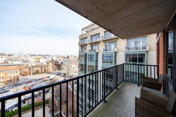 a view of city from a balcony