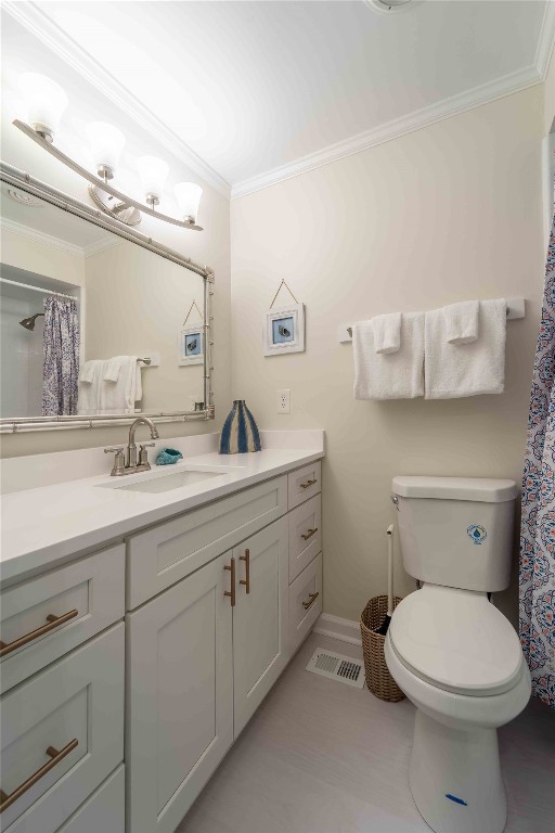 2562 Forest Ridge Drive, Unit P2 Fernandina Beach, FL 32034 - Photo 18 of 23 a bathroom with a toilet a sink and mirror