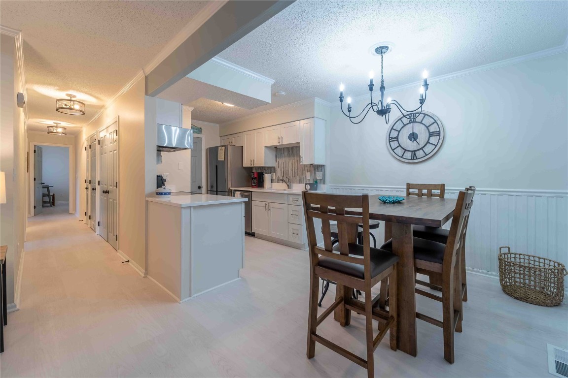 2562 Forest Ridge Drive, Unit P2 Fernandina Beach, FL 32034 - Photo 5 of 23 a view of a dining room with furniture