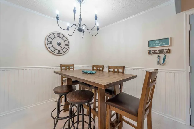 a view of a table and chairs in a room