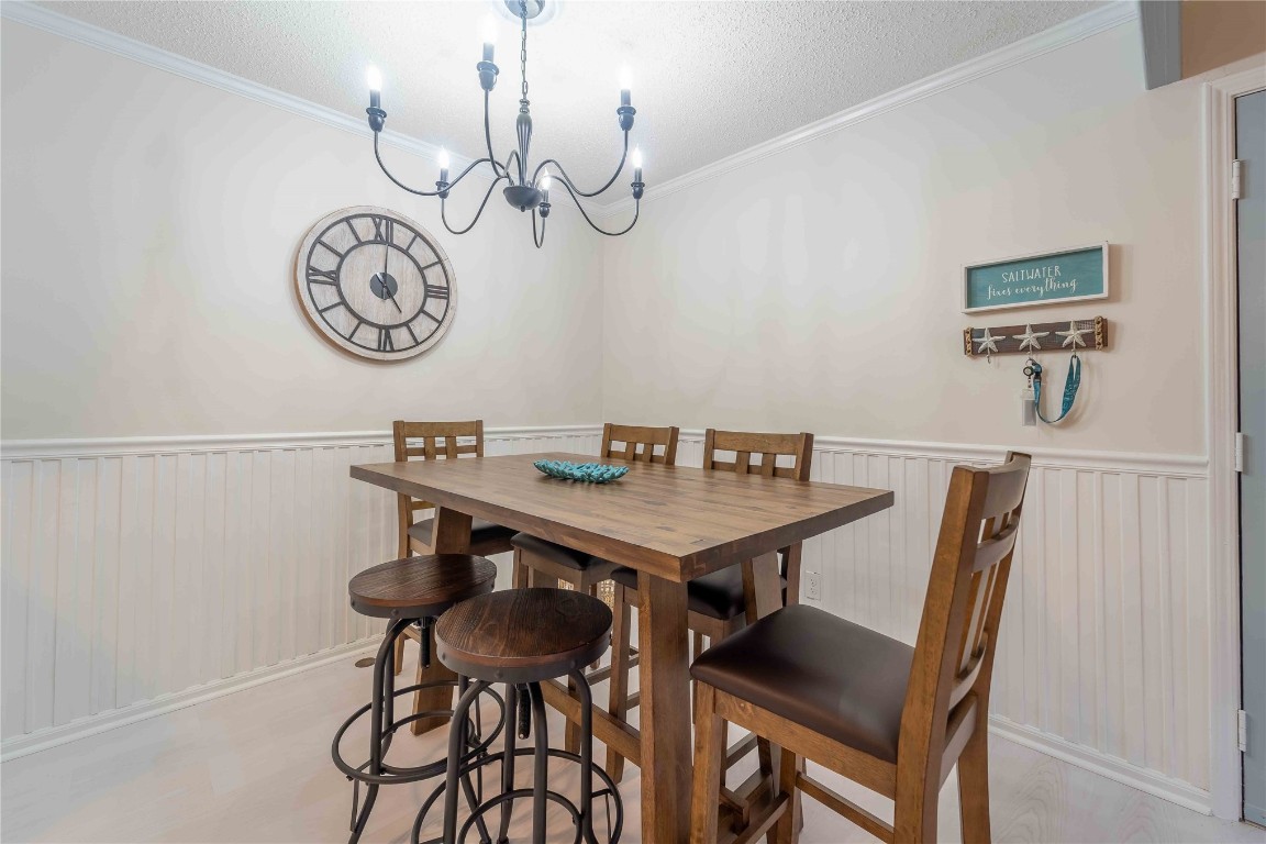 2562 Forest Ridge Drive, Unit P2 Fernandina Beach, FL 32034 - Photo 6 of 23 a view of a table and chairs in a room
