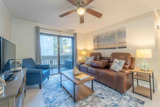 a living room with furniture and a window