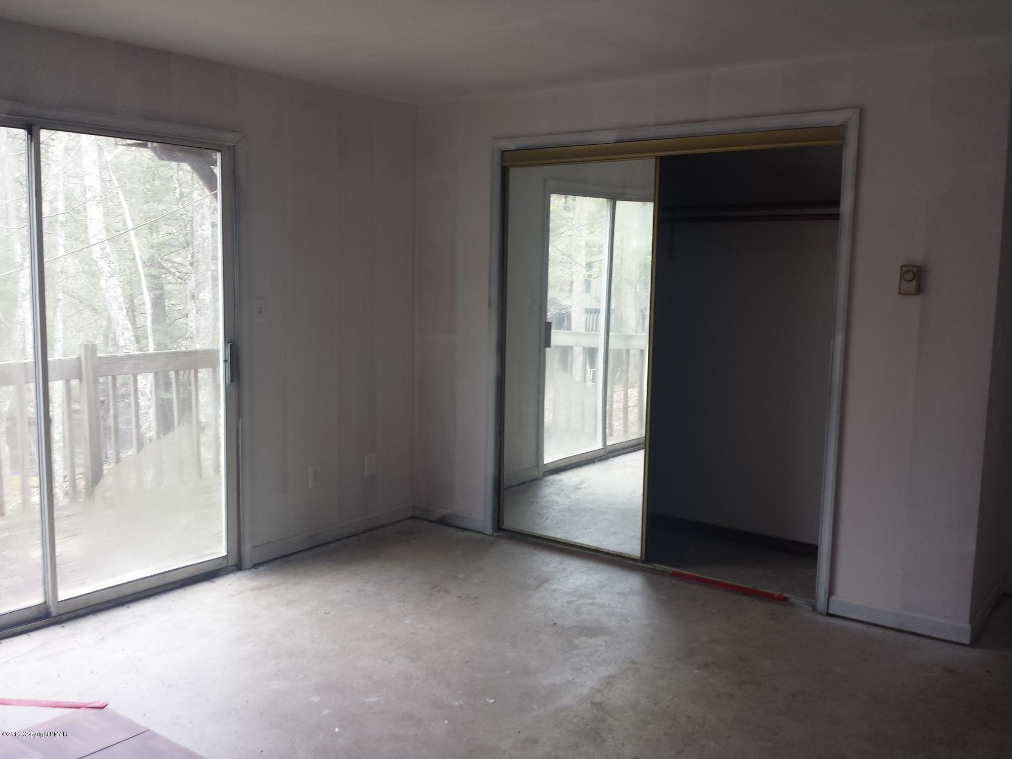 5766 Decker Road Bushkill, PA 18324 - Photo 13 of 13 a view of an empty room with a window
