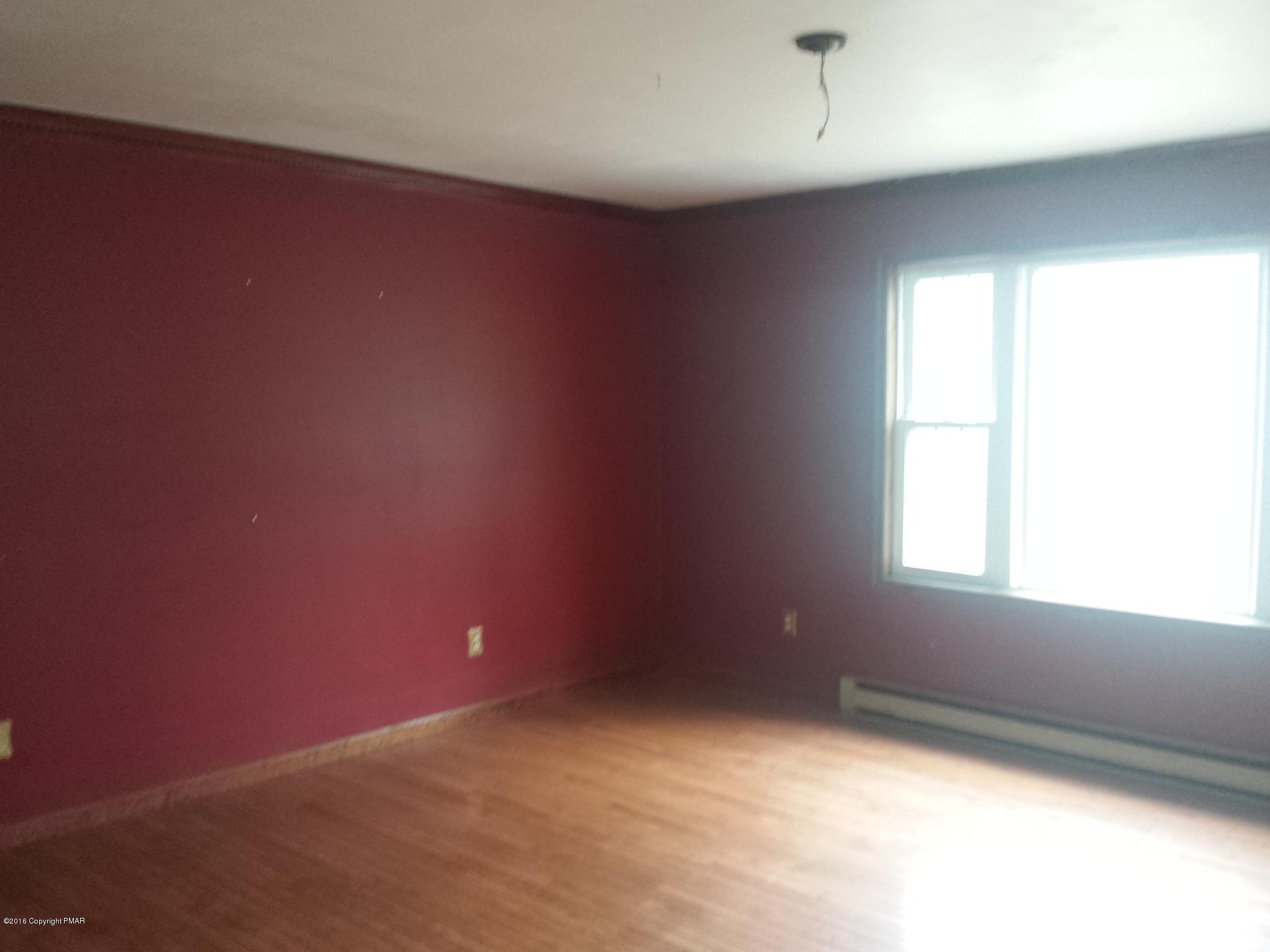 5766 Decker Road Bushkill, PA 18324 - Photo 5 of 13 an empty room with a window
