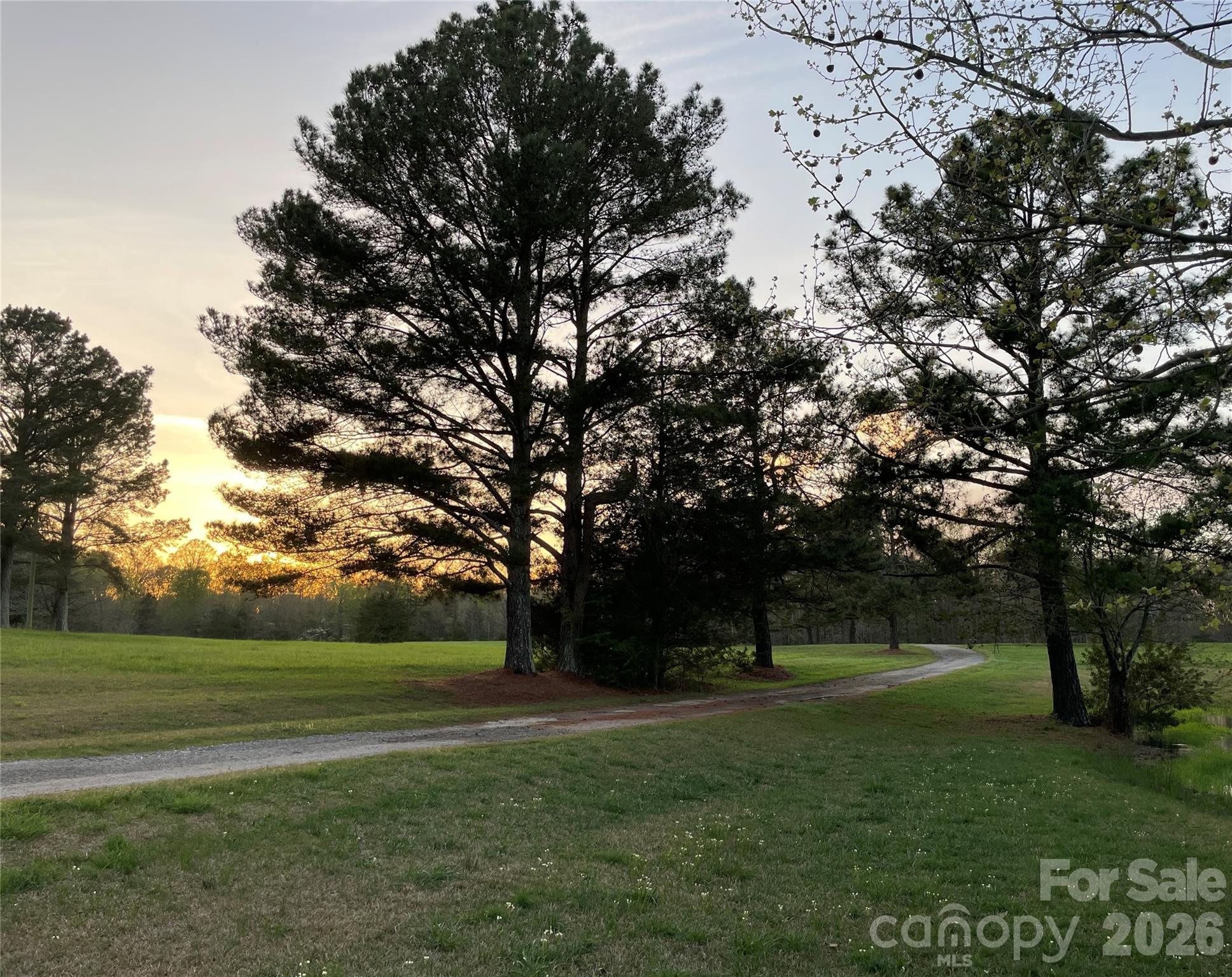 4445 Rowell Road Lancaster, SC 29720 - Photo 28 of 37 a view of outdoor space with green field