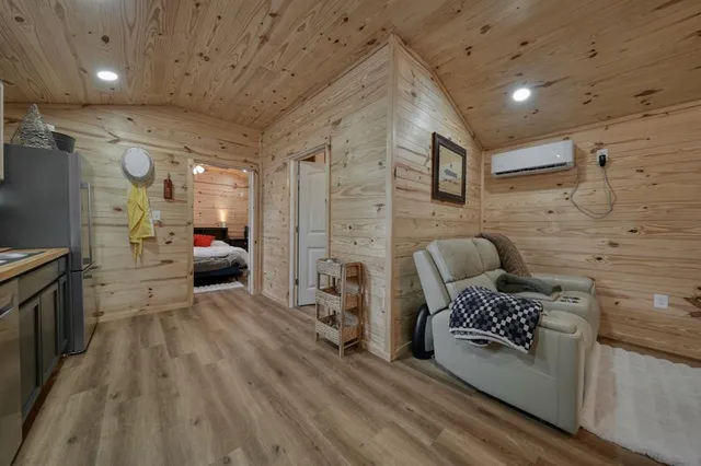 a bathroom with a toilet a sink and a mirror