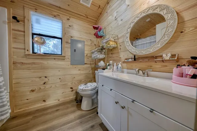 a bathroom with a bathtub and shower