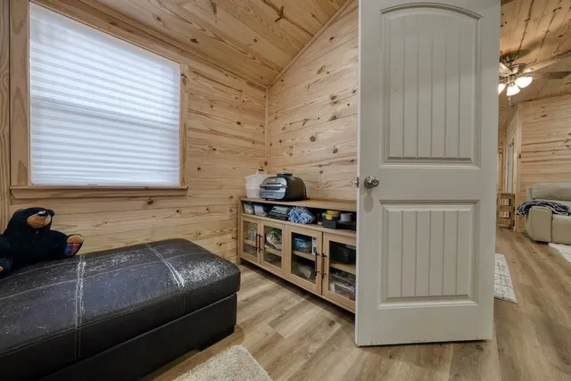 a view of a walk in closet and bedroom