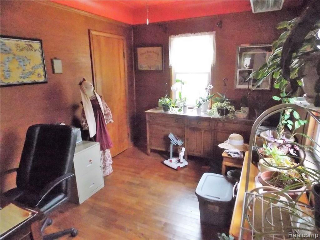 1200 North Maple Leaf Road Lapeer, MI 48446 - Photo 7 of 22 The study was utilized as grandmas sewing room. It could also be a 5th bedroom if the family needed 2 bedrooms downstairs. The hardwood floors that are in the living room and the study have been well cared for over the years.
