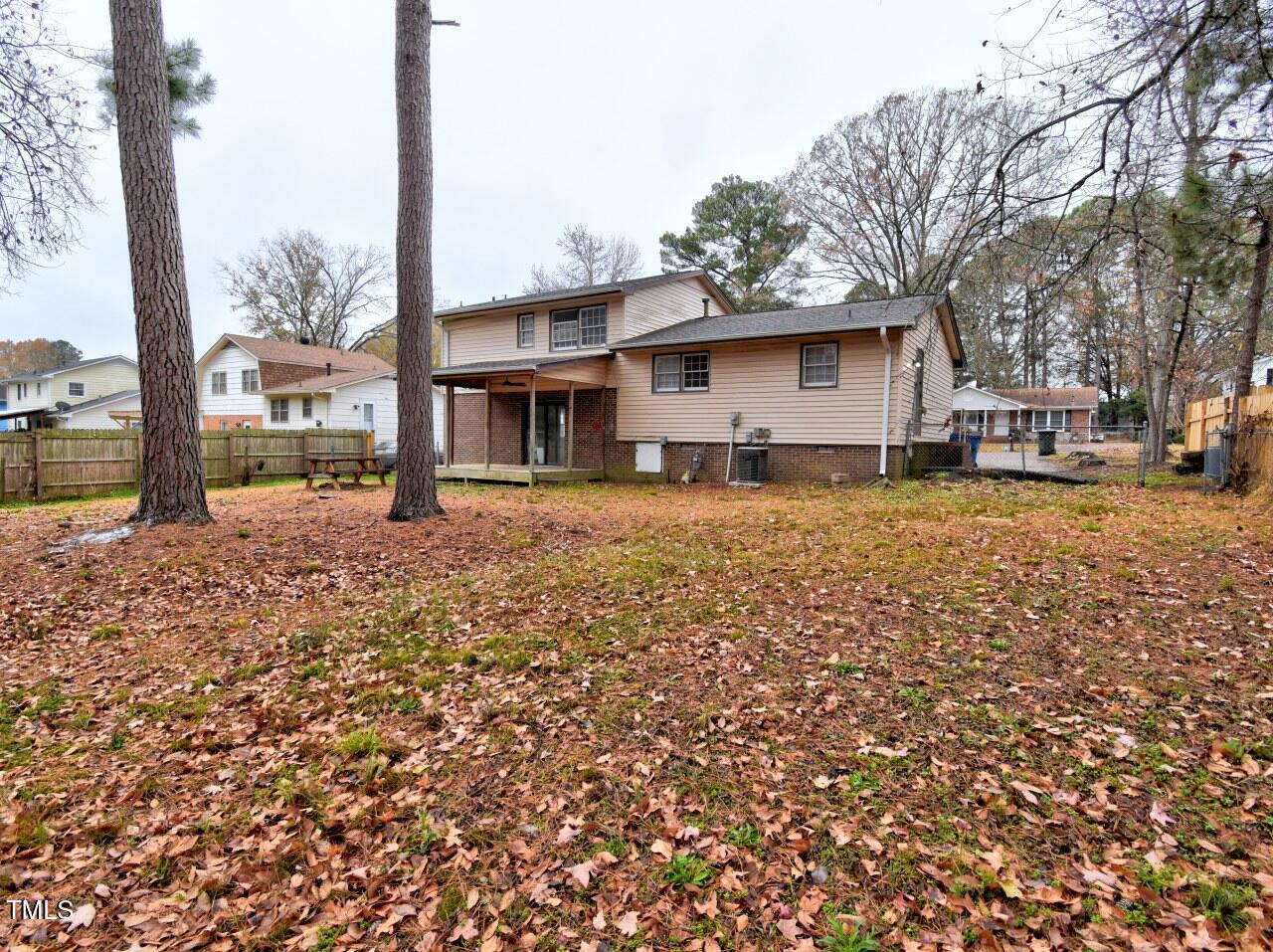 4612 Limerick Drive Raleigh, NC 27604 - Photo 20 of 26 a house with trees in the background