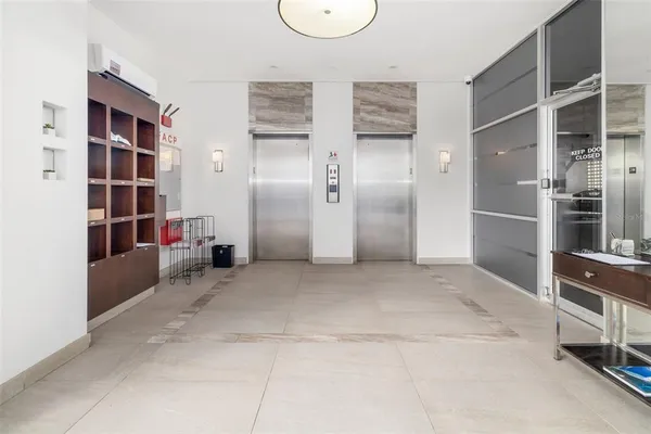 a view of empty room with shelves