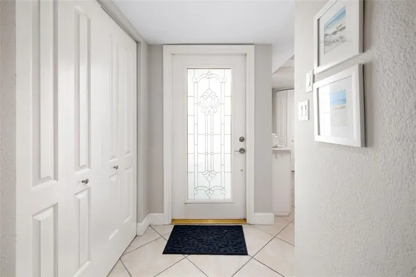 a view of a hallway with windows
