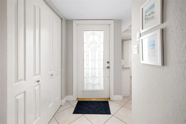 a view of a hallway with windows
