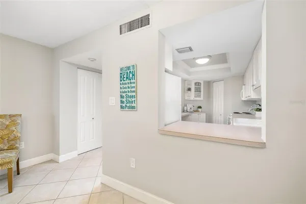 a view of kitchen with furniture and wooden floor
