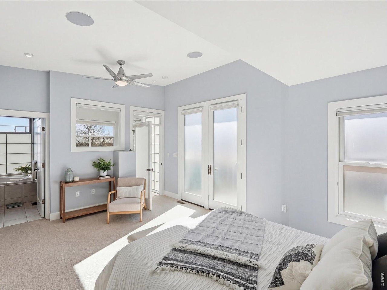 2336 Spruce Street, Unit E Boulder, CO 80302 - Photo 21 of 48 a bedroom with a bed and furniture