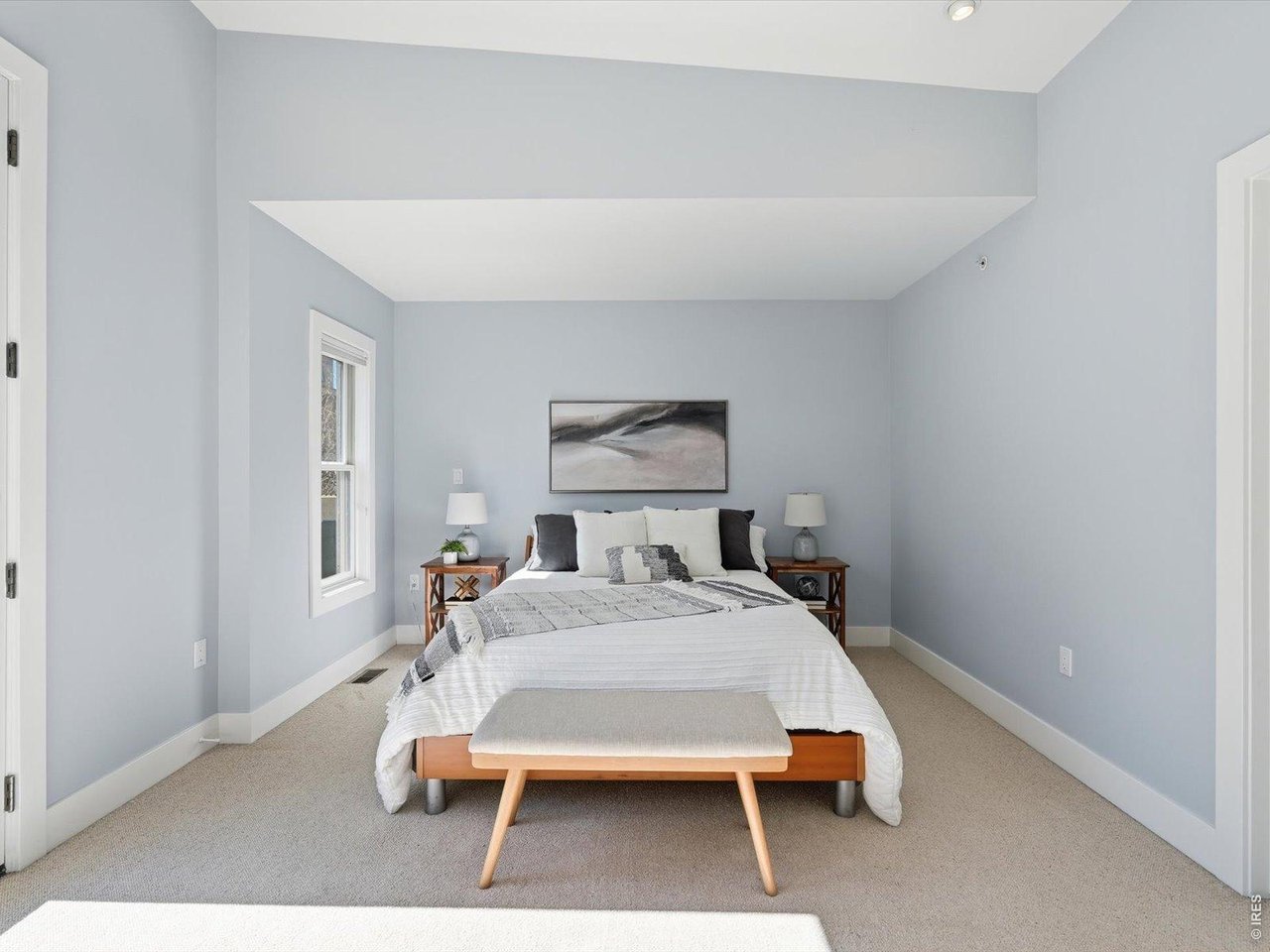 2336 Spruce Street, Unit E Boulder, CO 80302 - Photo 22 of 48 a bedroom with a bed and a table in it