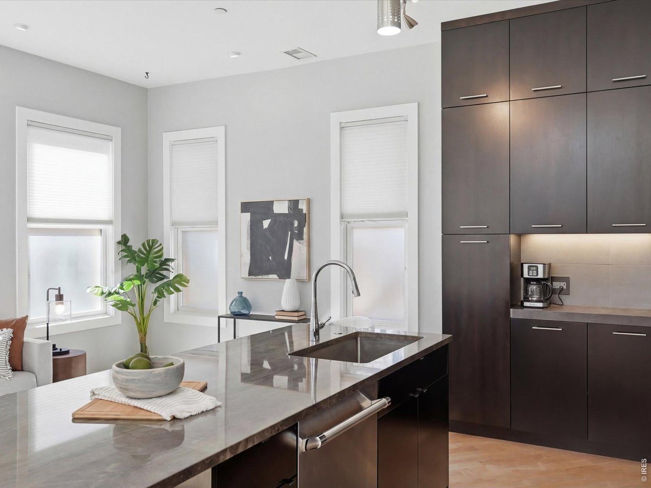 2336 Spruce Street, Unit E Boulder, CO 80302 - Photo 6 of 48 a kitchen with a sink and center island